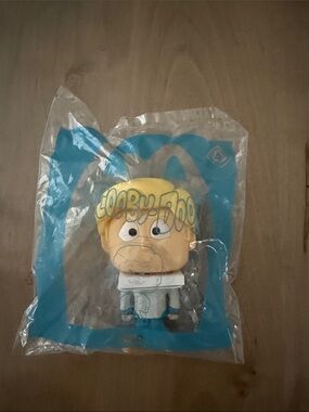 Warner Bros. Scooby-Doo Figure with Yellow Hair and Blue Outfit